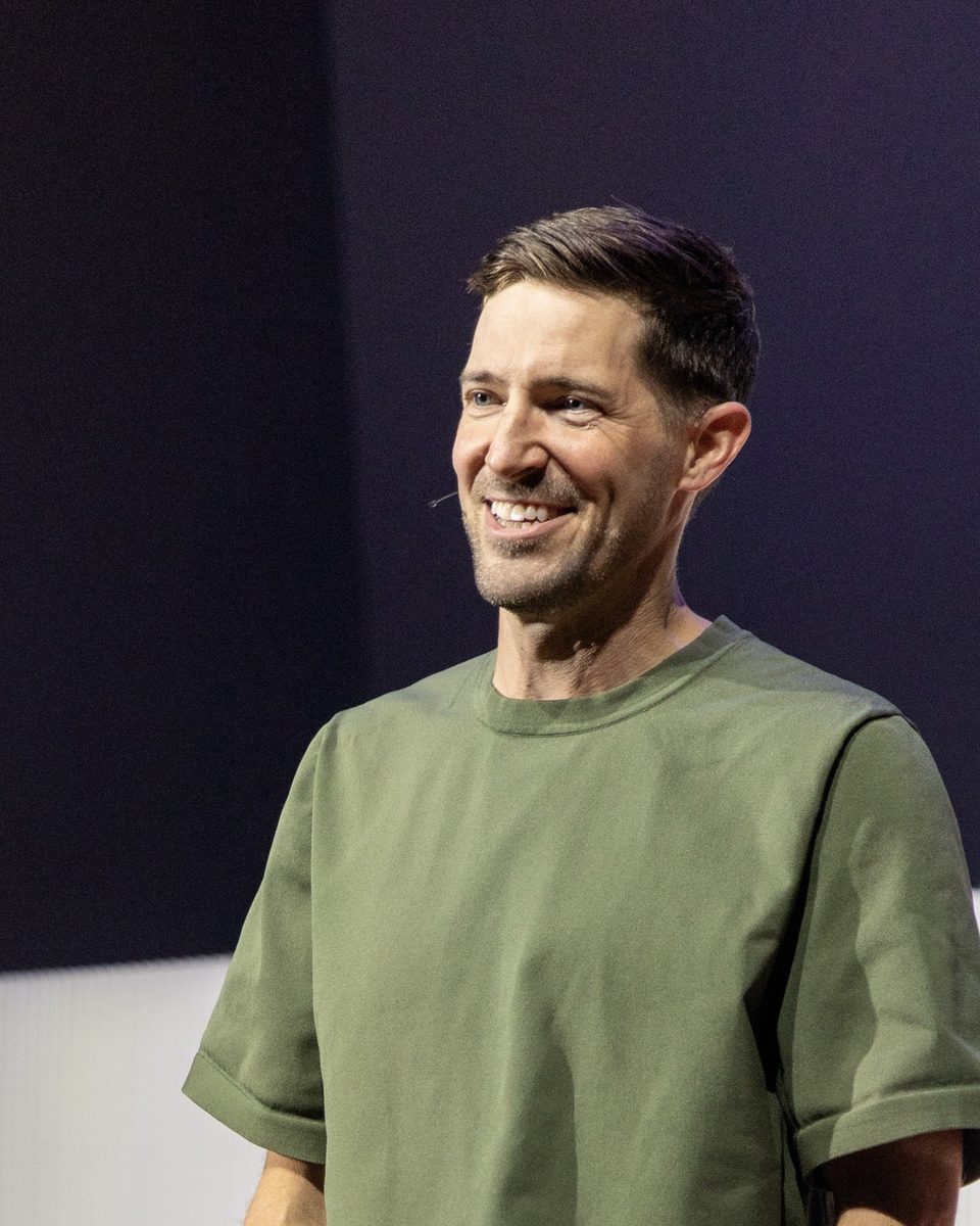 Parker Manuel smiling while teaching